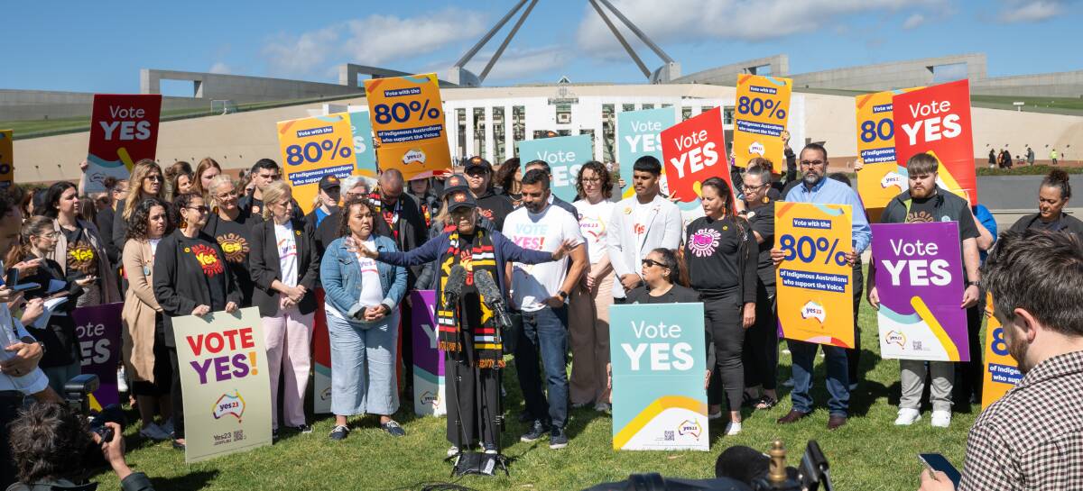Ngunnawal elder Aunty Violet Sheridan speaks at a "Yes" campaign event outside Parliament House on Friday. Picture by Sitthixay Ditthavong 
