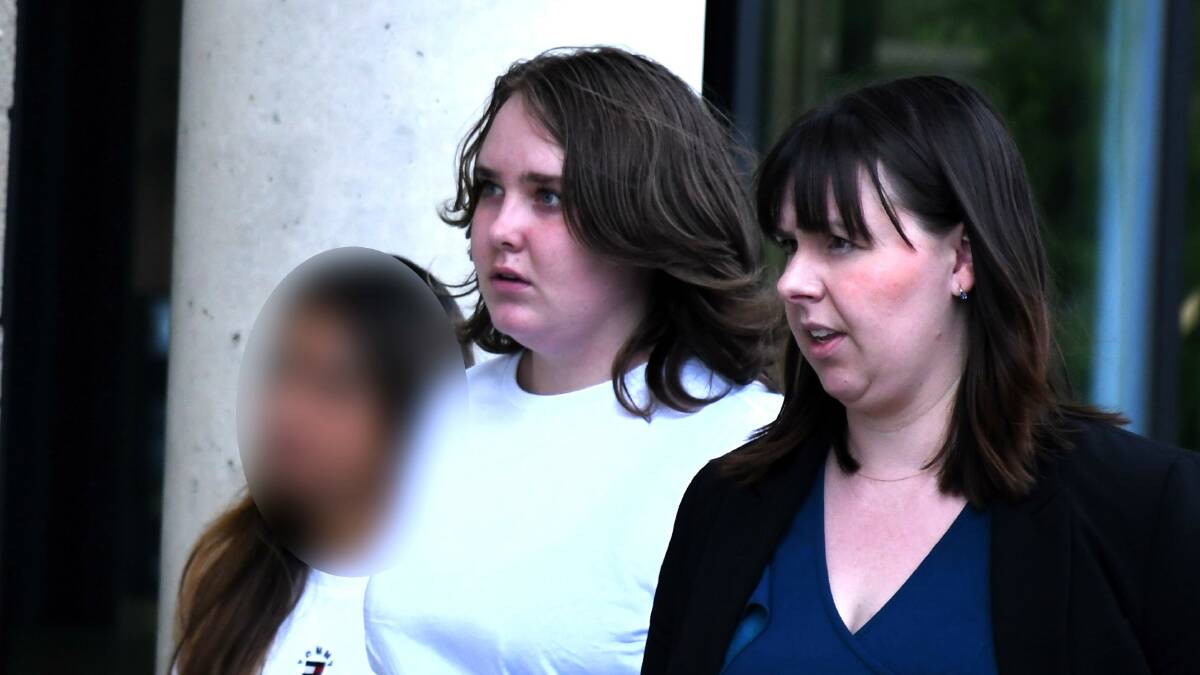 Shakira Adams, left, leaves court with Legal Aid lawyer Ellie Wallis. Picture by Hannah Neale