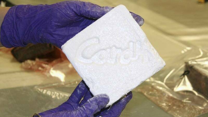 A block of cocaine police found in the container. Picture supplied