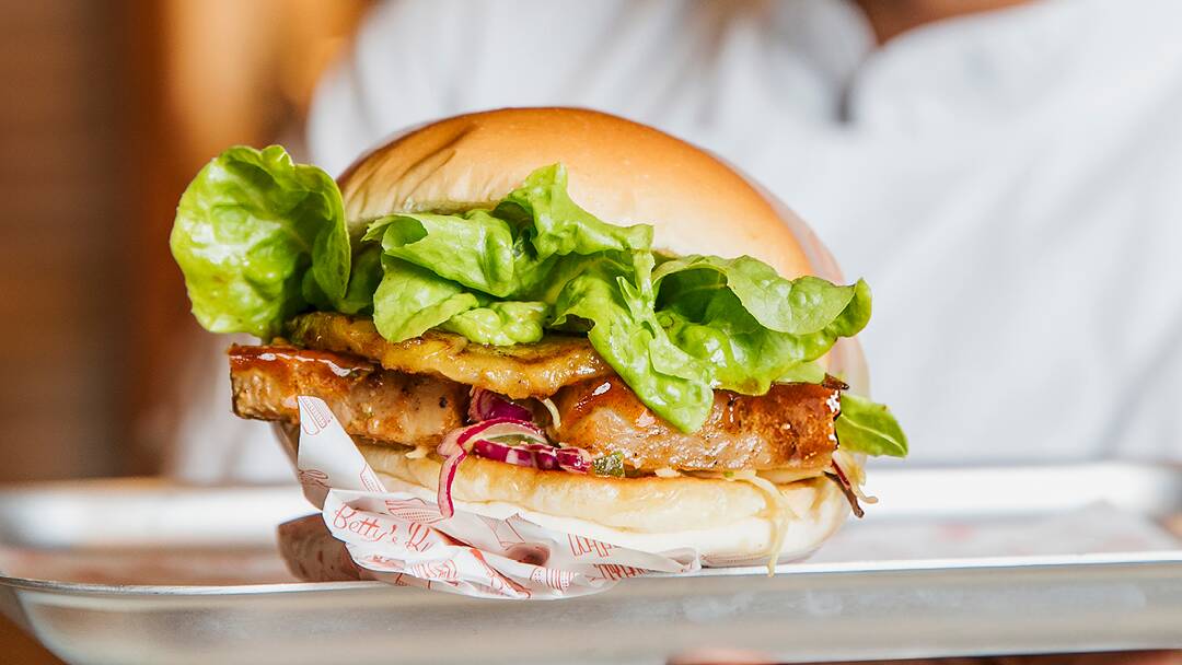 Khanh Ong's glazed pork belly burger. Picture supplied