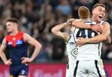 If form is anything to go by, Carlton and the Dees are preparing to fight out another MCG thriller. (James Ross/AAP PHOTOS)